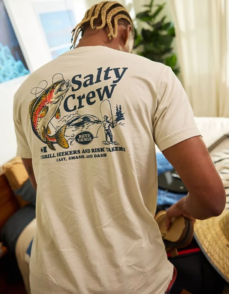 Fisherman-style tee with coastal outfit flatlay – 2025 POD fashion trend